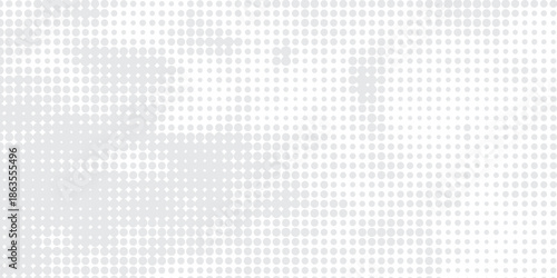 Clean abstract background with light gray halftone dots forming a soft textured surface for modern design projects.