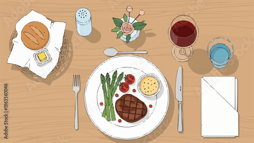 Elegant steak dinner with asparagus and wine served on a table.