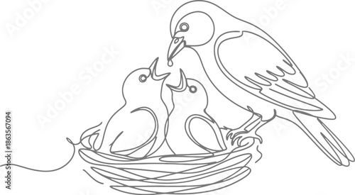 Mother bird feeding her chicks in the nest