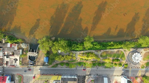 Top Down Aerial of Tropical City River and Urban Green Corridor