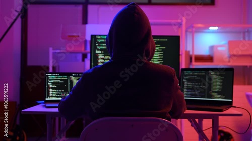 Hacker scammer coding trojan or computer virus to hacking security system break secret organization system. 