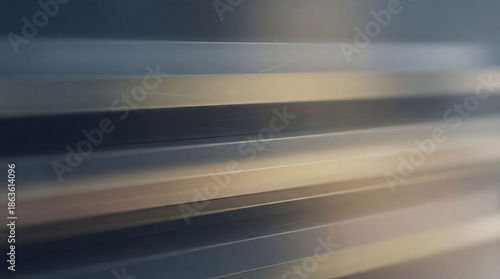 Abstract metallic horizontal corrugated lines modern surface background texture reflection silver gray color palette