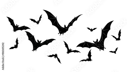 A flock of black silhouette bats flying in a scattered formation against a white background.