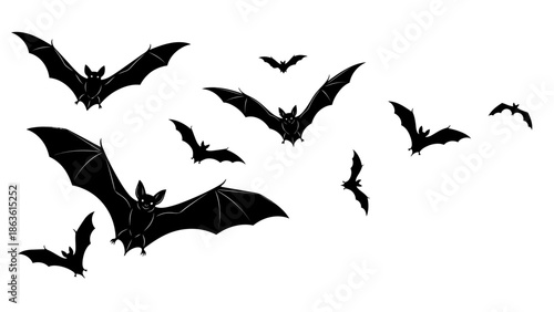 A flock of black bats silhouetted against a white background, flying in a dynamic formation.