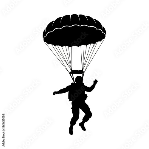 Silhouette of a skydiver in mid air with a fully deployed parachute