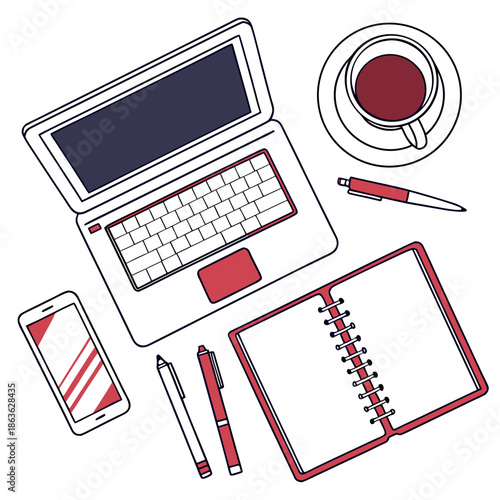 A modern workspace with a laptop, phone, and office supplies