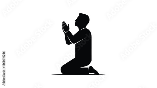 Man in silhouette praying on his knees with hands together