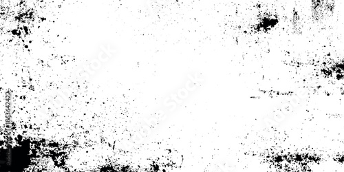 A grayscale textured background featuring scattered dark speckles and a distressed grainy aesthetic for design elements