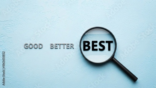 Magnifying glass highlighting the word BEST in a sequence of GOOD BETTER BEST emphasizing quality comparison and selection in a minimalistic style