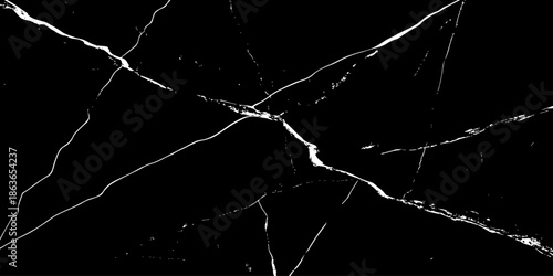 Abstract black marble texture with sharp white lightning-like veins crossing diagonally on a deep dark surface. High-contrast natural stone pattern ideal for luxury backgrounds, wallpaper, branding.