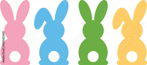 Four cute pastel colored bunny rabbit silhouettes stand in a row for Easter celebrations