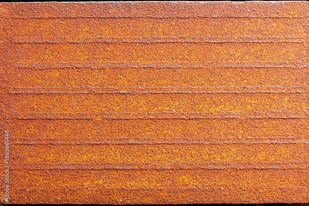 © hantu - Rusty, textured metal sheet with horizontal lines and varied tones