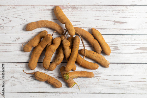 Quadro em tela Tamarind is a tangy-sweet tropical fruit with sticky pulp, used in chutneys, cur