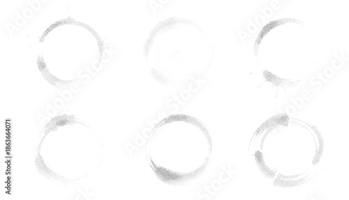 Six stippled circles vector set. Grunge textured round shapes, spiral spot, and ink stain effects.