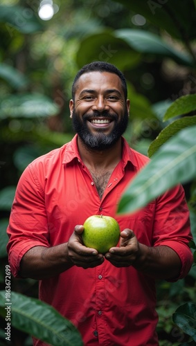 Wallpaper Mural young man holding an apple Torontodigital.ca