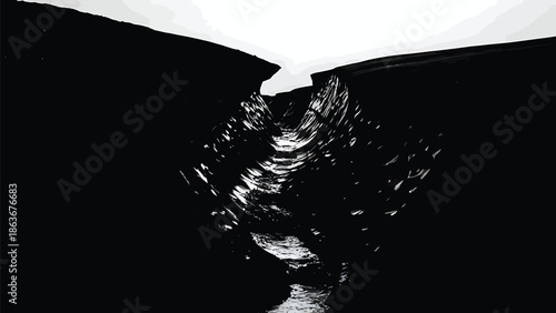A dramatic black and white photograph captures a narrow canyon with light reflecting on the water below