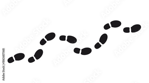 A winding trail of black footprints suggesting movement and direction