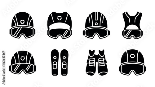 Ski and snowboard gear icons set in silhouette style