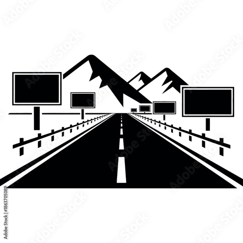 Long asphalt highway stretches toward mountains with many roadside billboards.