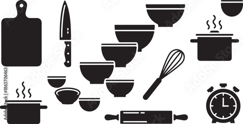 A collection of kitchen utensils and cooking tools