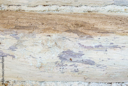 Detailed close up of rustic wooden planks with natural grain, rough texture, scratches, and weathered surface. Perfect background for design projects, vintage decor, carpentry, and creative artwork.