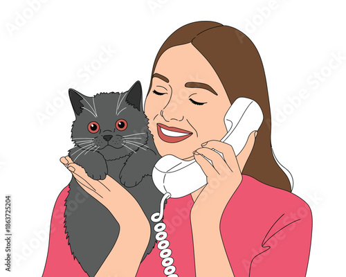 Smiling woman happily talking on a retro phone while holding her beloved fluffy cat