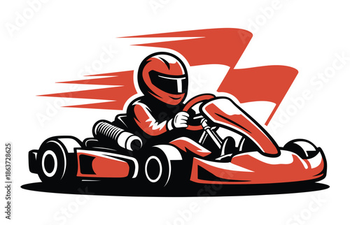 A go-kart driver wearing a helmet and racing on a track with motion blur