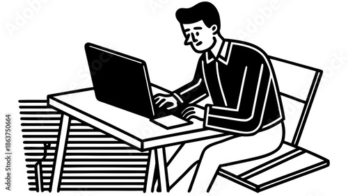 Businessman working diligently at modern office desk with laptop