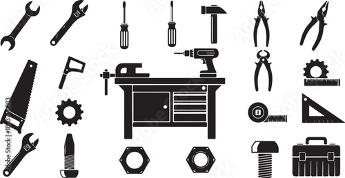 A collection of various tools on a workbench