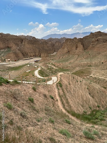 Summer scenery of the Yellow River Stone Forest National Geological Park with Stone pillars and path in Jingtai county, Gansu province of China