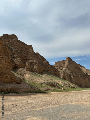 Summer scenery of the Yellow River Stone Forest National Geological Park with Stone pillars and path in Jingtai county, Gansu province of China
