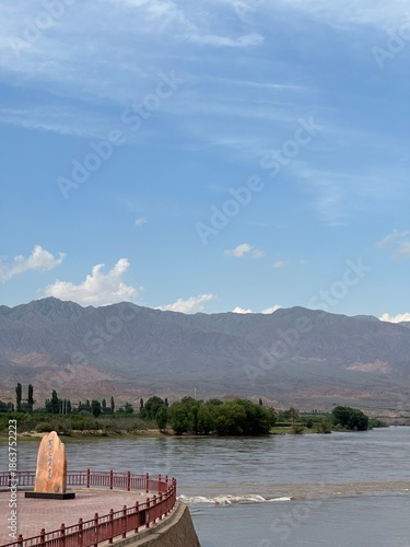 Summer scenery of the Yellow River (Huanghe) and stone tablet with words: 