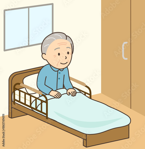 介護ベッド上で起き上がっているおじいさん
