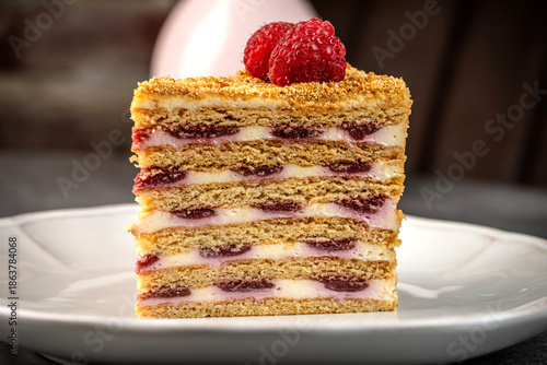 Layered honey cake with raspberry cream