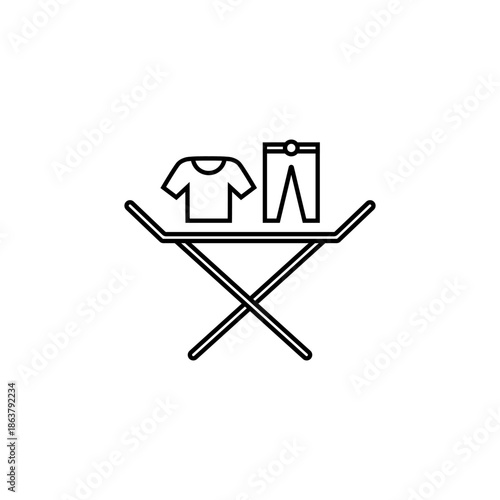 Clothes drying rack icon. Stand for dryer clothes. Portable folding clothes drying rack with a shirt and pants. Isolated vector illustration on white background.