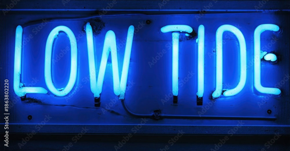 Obraz premium Bright blue neon sign displays words low tide. Dark background emphasizes glowing text. Simple, direct message.