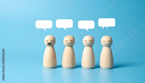 Wooden figurines with speech bubbles on blue background.