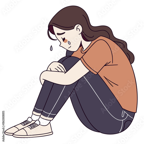 A person sits curled up on the ground, arms wrapped around their knees, head bowed, and a tear falling conveying a quiet moment of sadness or emotional vulnerability.