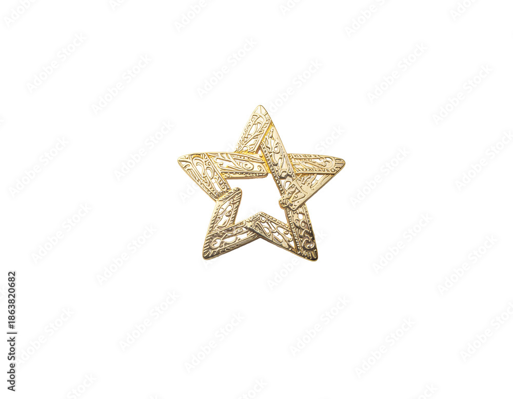 Fototapeta premium Ornate gold star charm with intricate engraved details
