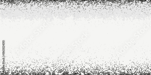 A stark grainy texture with a white center and dark speckled edges