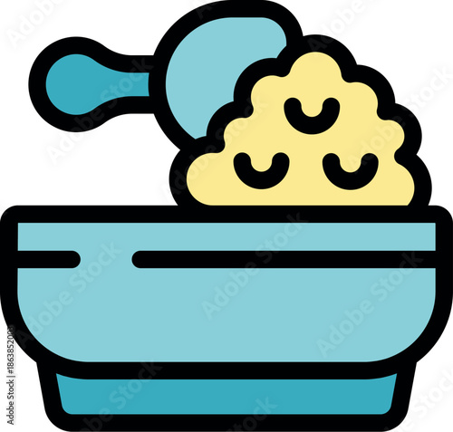 Dry baby food is being poured from a plastic spoon into a bowl