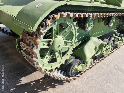 Old green tank from 1935, highlighting its imposing appearance and military characteristics