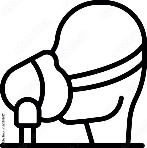 Medical oxygen mask covering doctor's nose and mouth during a medical procedure