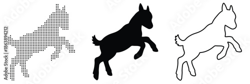 Energetic young goat leaping with joy in a dynamic pose