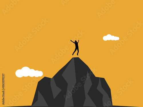 businessman jumped for joy on top of the high mountain