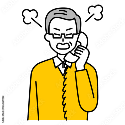 固定電話で怒っている年配の男性