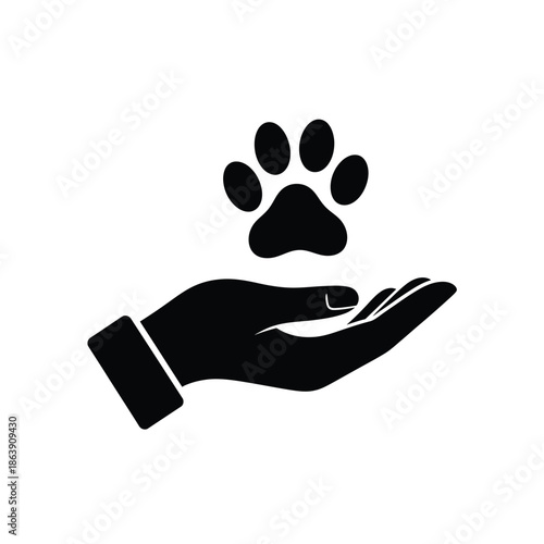 A black and white depiction shows a human hand gently cradling a paw print symbolizing care and animal welfare
