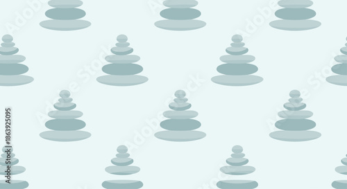 Serene pattern of balanced stacks of smooth grey and blue stones representing zen and tranquility on a light pastel blue background for spa.