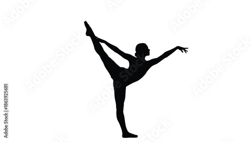 Silhouette of a graceful dancer performing a challenging balance pose holding one raised leg high