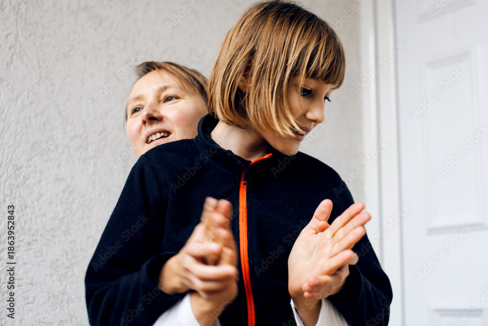 Fototapeta premium mother with daughter hugging, lifestyle people concept